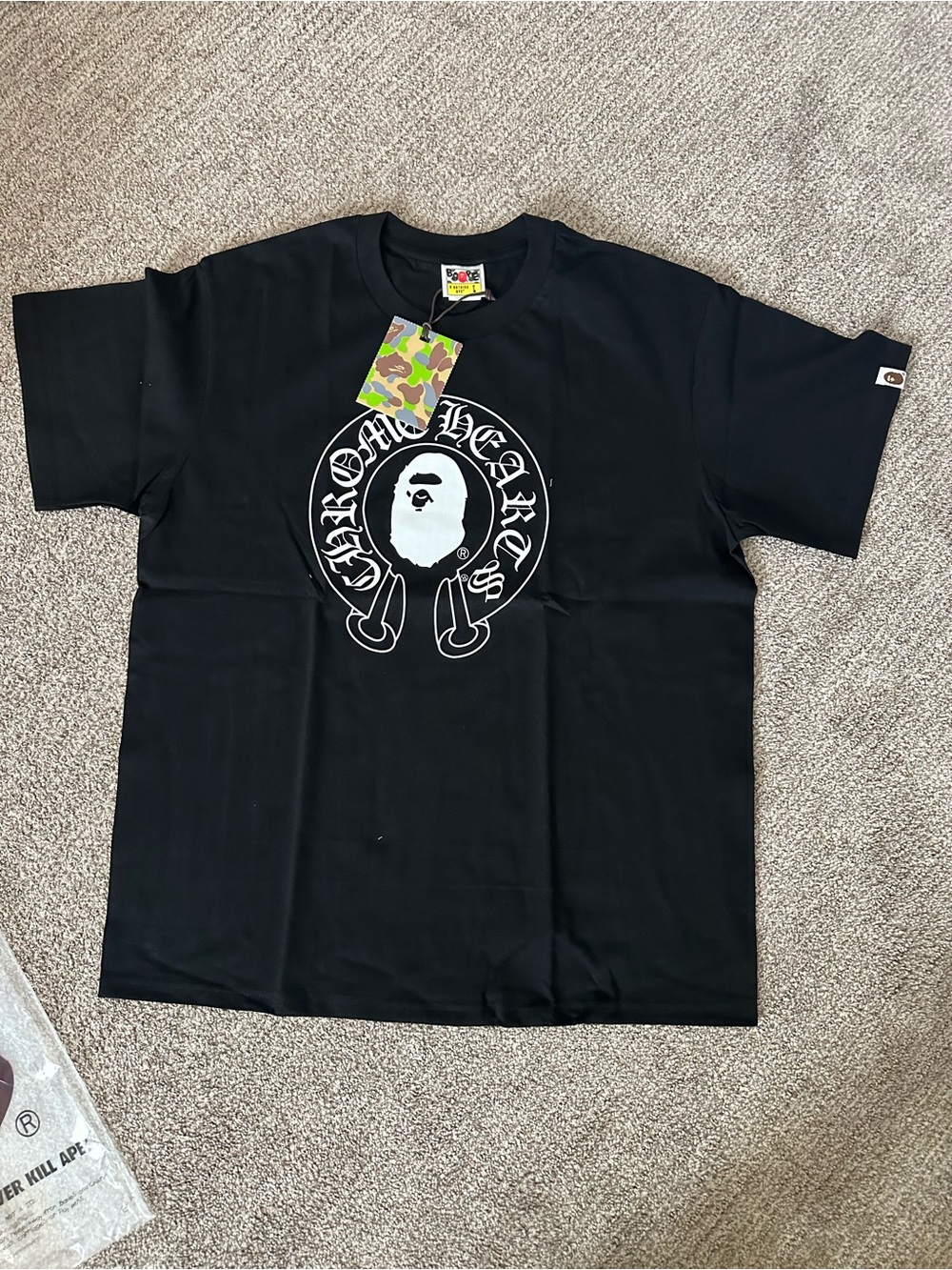 Bape Black Tee with White Ape Head and Script Graphic